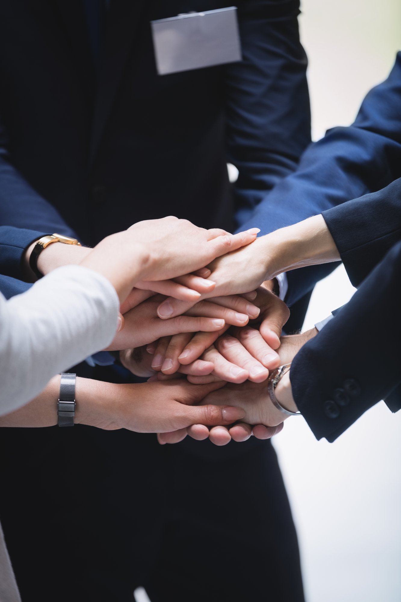 hands-stack-business-people hands-stack-business-people
